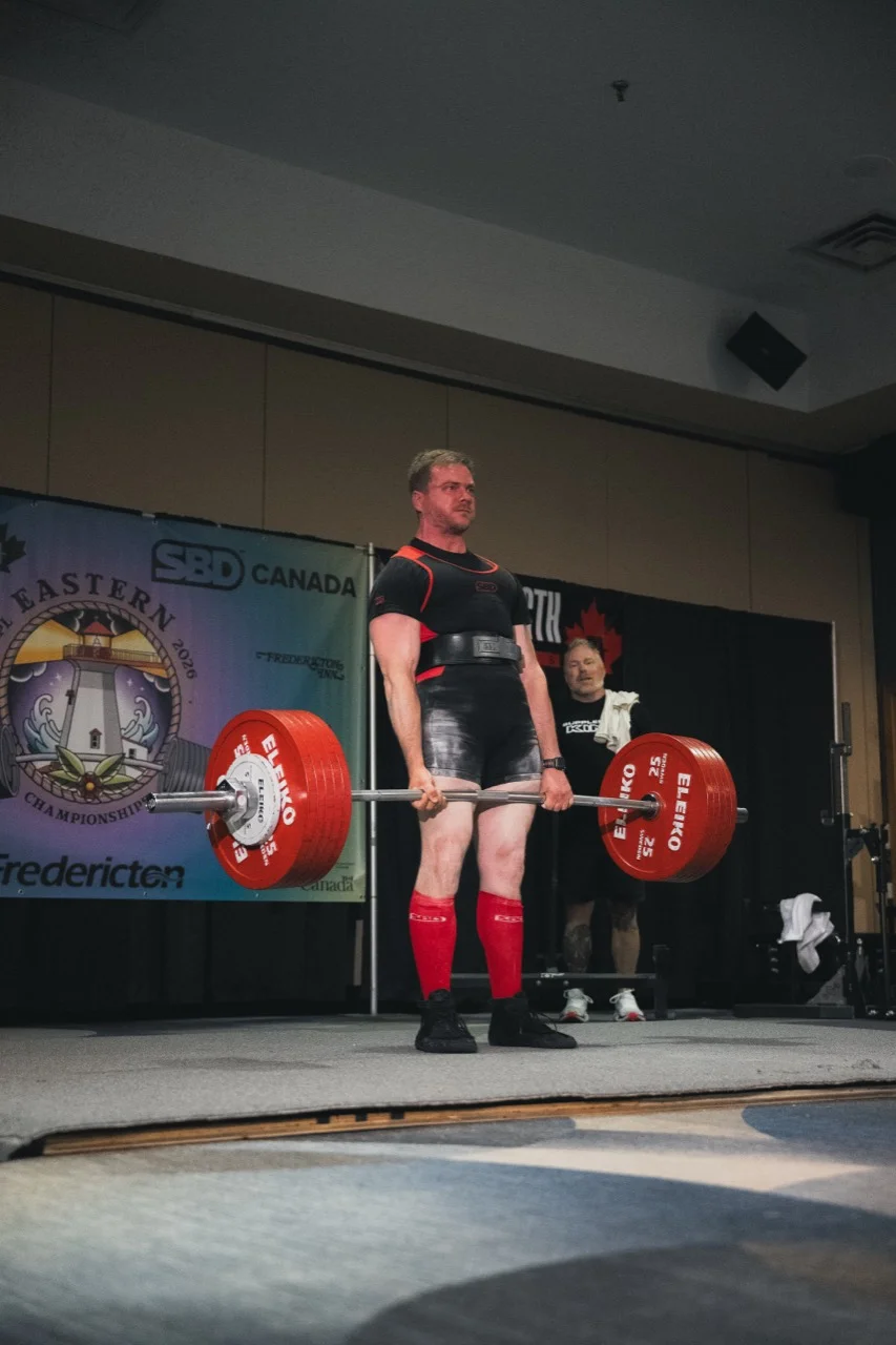 Patrick Boyce completing a competition deadlift at the 2026 Eastern Championships.